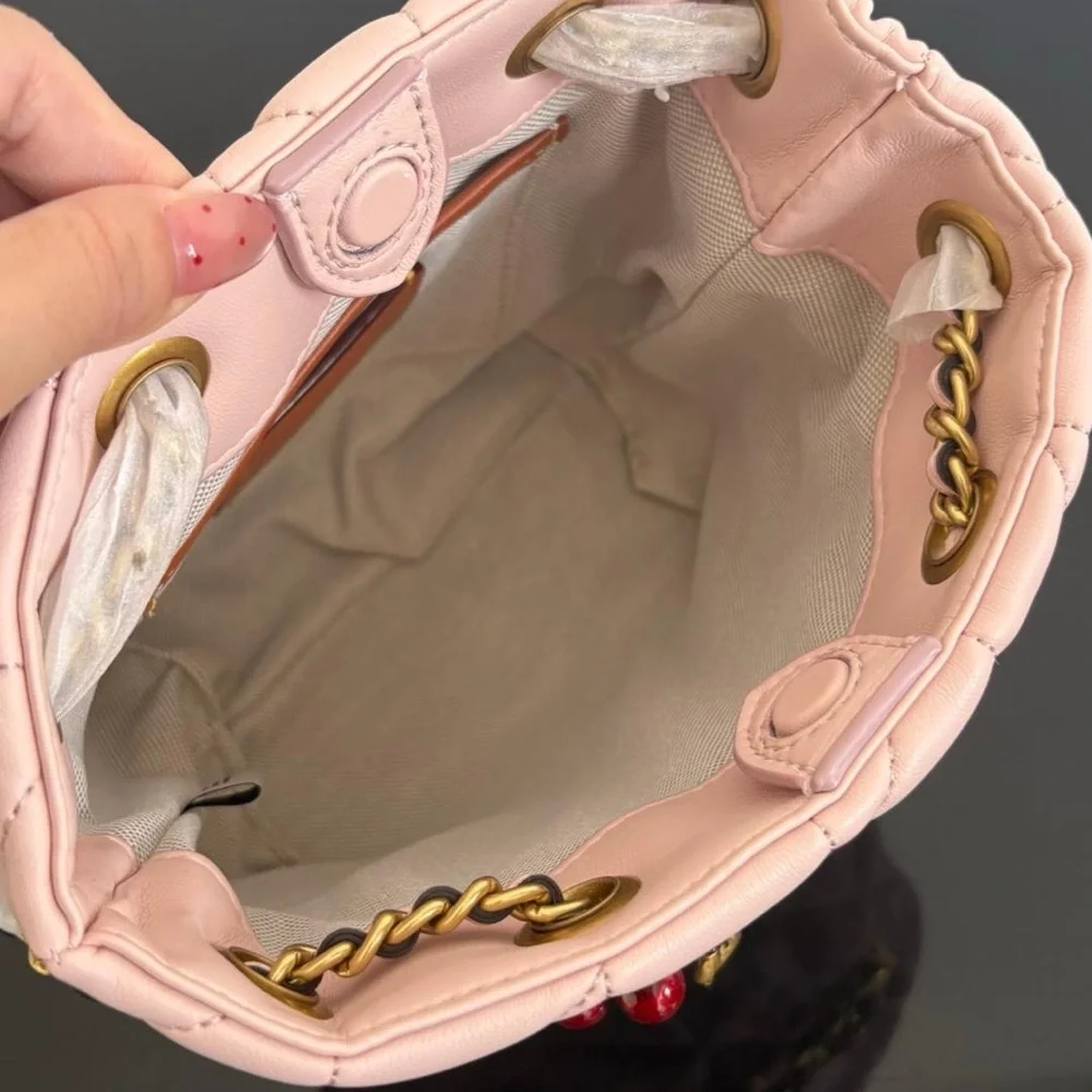 Coach Pink Quilted Crossbody with Charm Chain